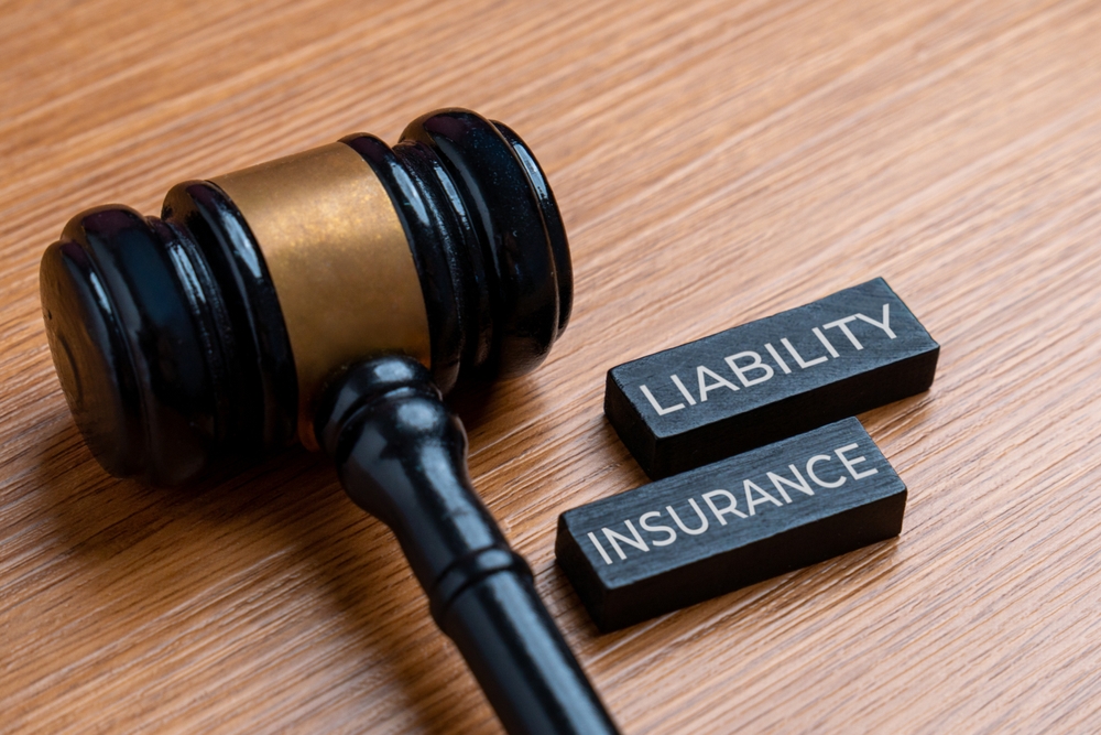 legal documents and gavel representing a property damage dispute